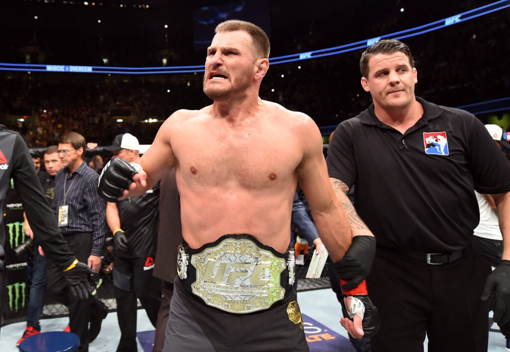 Stipe Miocic celebrates after stopping Alistair Overeem at UFC 203