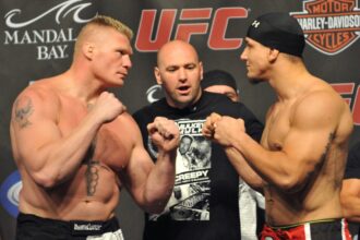 Brock Lesnar and Frank Mir face off at the UFC 100 weigh-ins