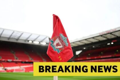 Liverpool corner flag with overlay of breaking news