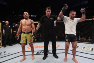 Alexander Volkanovski celebrates defeating Jose Aldo at UFC 237