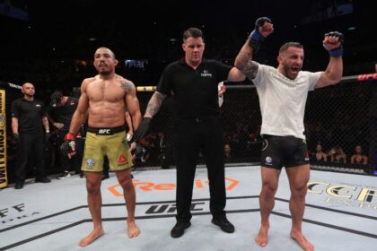 Alexander Volkanovski celebrates defeating Jose Aldo at UFC 237