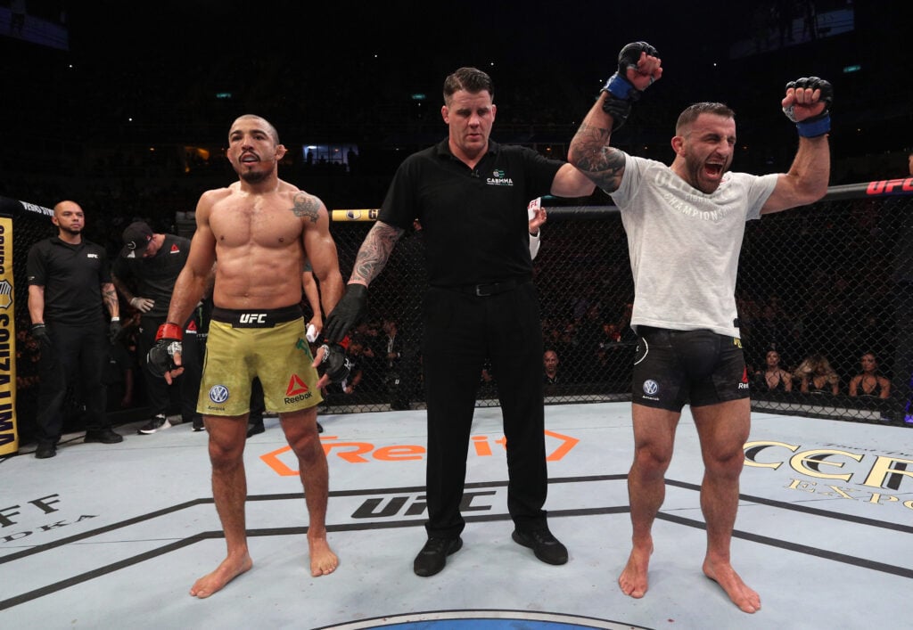 Alexander Volkanovski celebrates defeating Jose Aldo at UFC 237