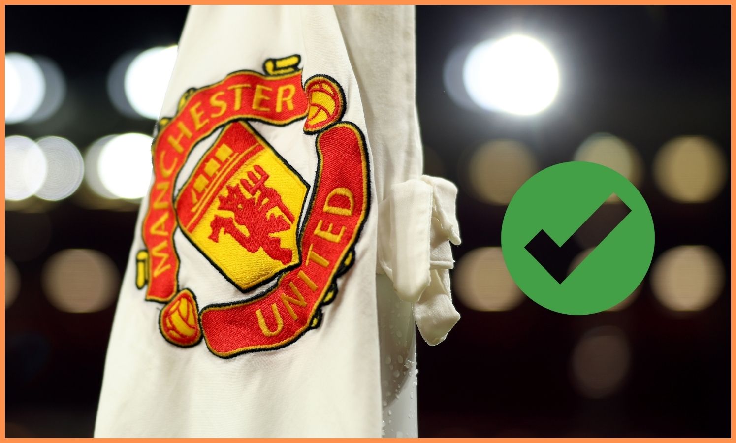 Manchester United logo on corner flag close-up