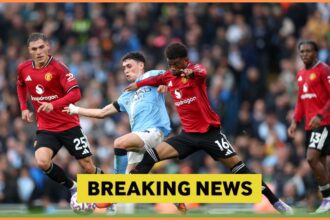 Manuel Ugarte in action for Manchester United against Manchester City
