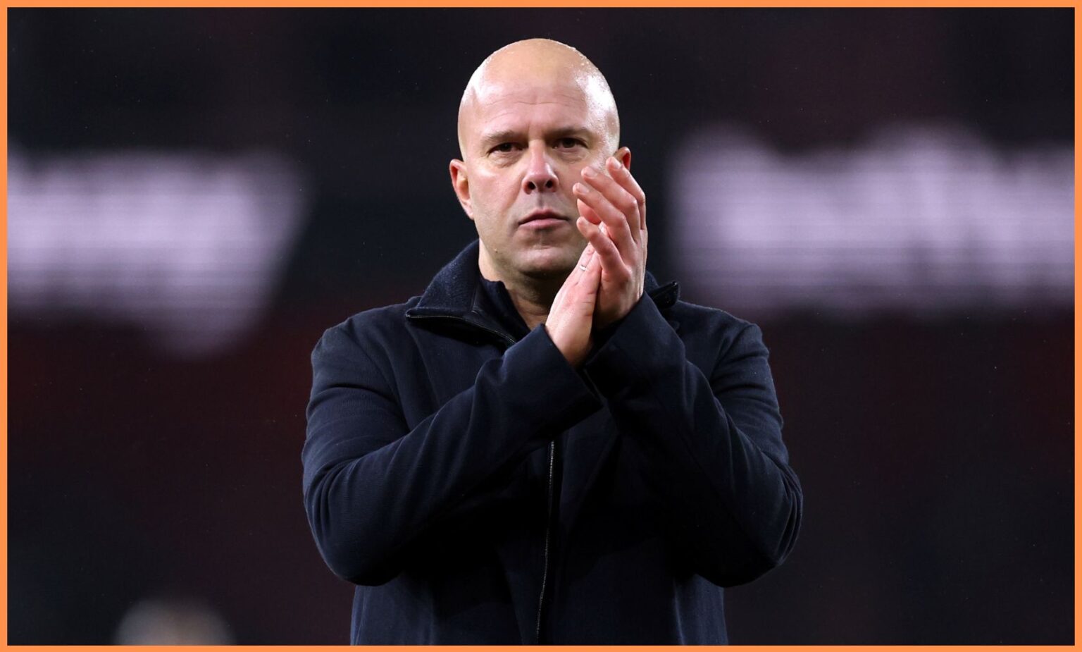 Liverpool manager Arne Slot applauds the fans after the Arsenal game