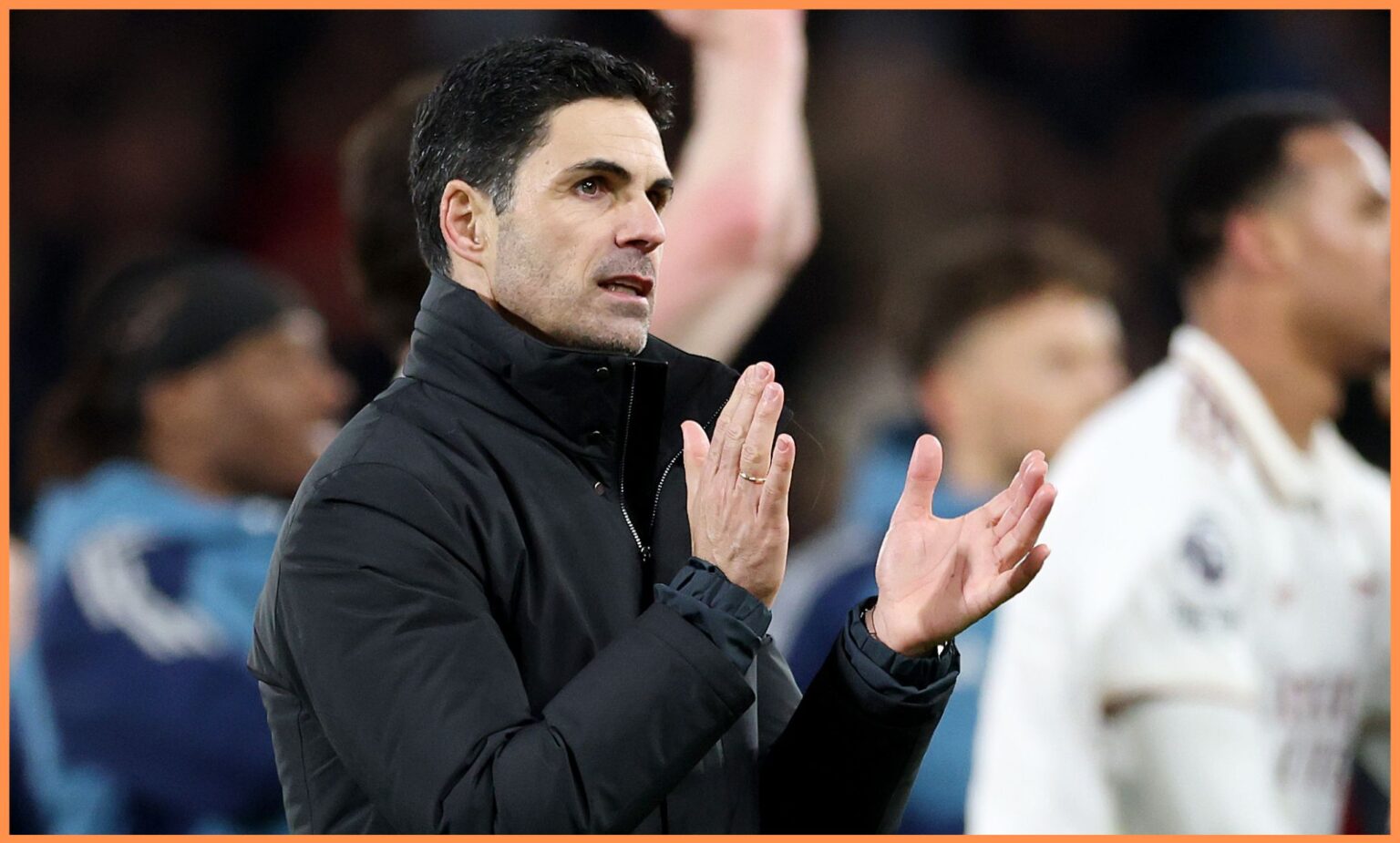 Mikel Arteta applauds the fans