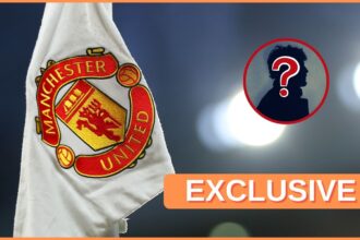 Manchester United logo on corner flag, and