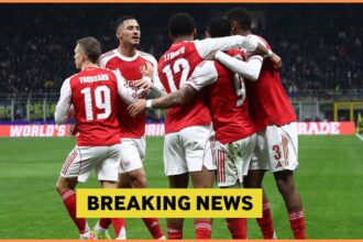 Arsenal players celebrate during the win at Inter Milan