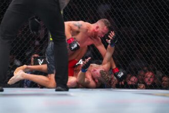 Justin Gaethje delivers ground and pound to Paddy Pimblett at UFC 324