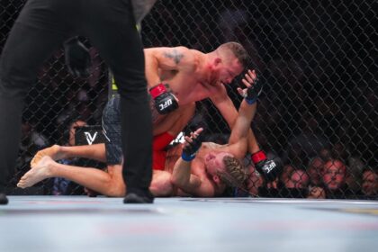 Justin Gaethje delivers ground and pound to Paddy Pimblett at UFC 324