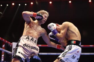 Naoya Inoue lands a body shot on David Picasso