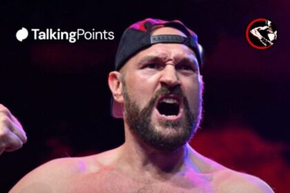 Tyson Fury steps on the scale before his fight with Francis Ngannou