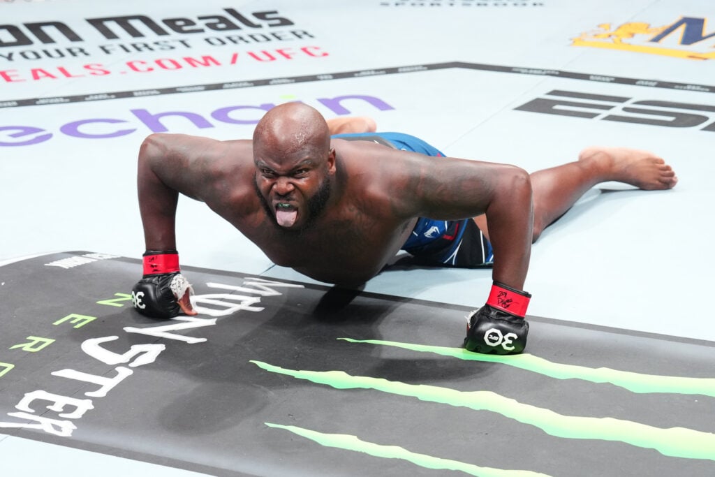 Derrick Lewis celebrates after knocking out Marcos Rogerio de Lima at UFC 291.