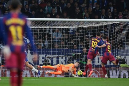 Barcelona use a late surge to win the Catalunya derby and put more pressure on Real Madrid in the La Liga title race