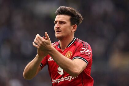 Harry Maguire applauding the Man United fans
