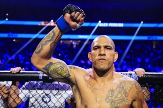 Alex Pereira in the Octagon ahead of his light heavyweight championship fight against Magomed Ankalaev at UFC 320 in October 2025.