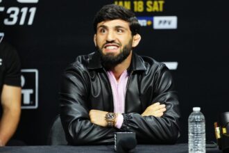 Arman Tsarukyan smiles at a press conference prior to his fight with Islam Makhachev at UFC 311 in January 2025.
