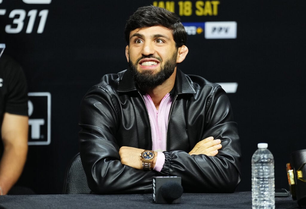 Arman Tsarukyan smiles at a press conference prior to his fight with Islam Makhachev at UFC 311 in January 2025.