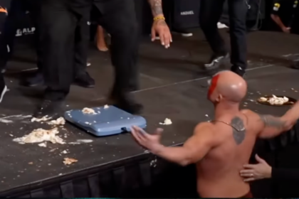 BKFC fighter falls off stage while trying to throw giant cannoli at opponent