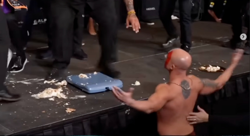 BKFC fighter falls off stage while trying to throw giant cannoli at opponent