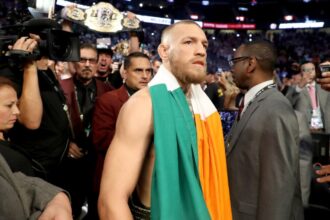 Conor McGregor steps into the ring to face Floyd Mayweather in 2017