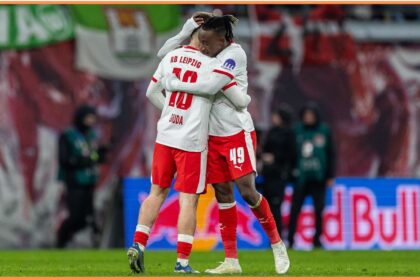 Yan Diomande celebrates with Brajan Gruda
