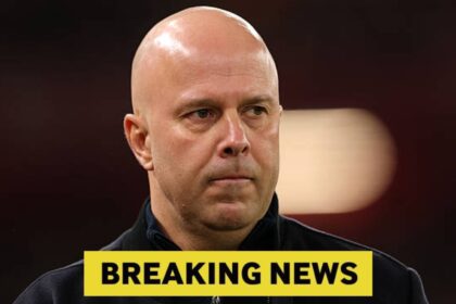 Liverpool manager Arne Slot looks upset with overlay of breaking news