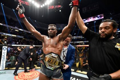 Francis Ngannou celebrates defeating Cyril Gane at UFC 270