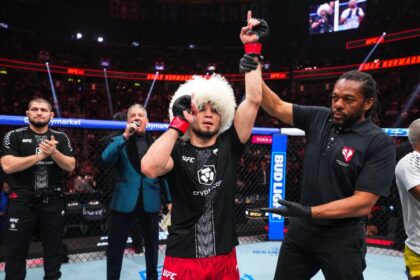 Umar Nurmagomedov raises his hand after victory at UFC 324