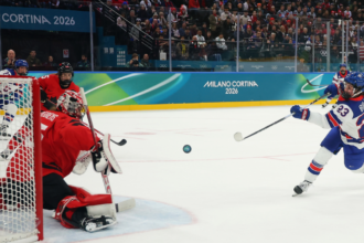 Team USA defeats Canada. University of Michigan ranks first in college basketball bracketology