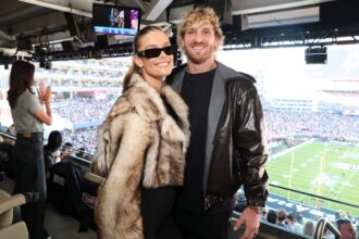 Logan Paul and Nina Agdal during Super Bowl 60