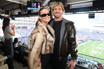 Logan Paul and Nina Agdal during Super Bowl 60