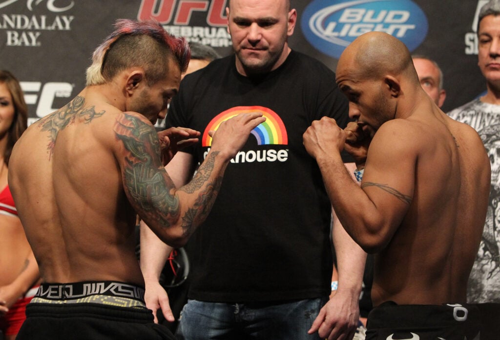 Dana White stands between Noriyoshi Yamamoto and Demetrius Johnson ahead of UFC 126