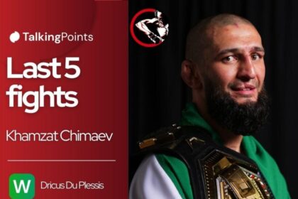 Khamzat Chimaev poses with his UFC middleweight title after UFC 319