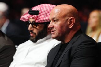 Dana White and Turki Alarcik watch from ringside on the Canelo Alvarez vs. Terrence Crawford undercard.