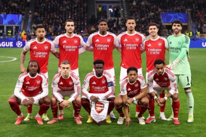 Arsenal players lining up for a Champions League game