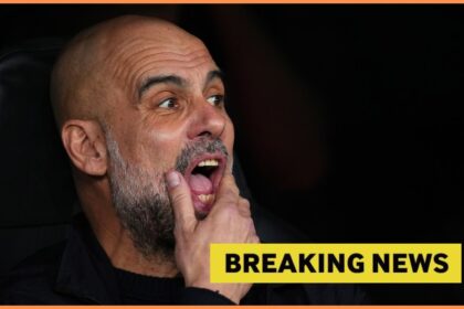 Pep Guardiola looks on, plus