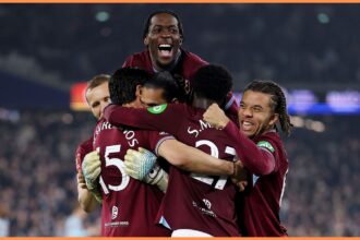 Axel Disasi celebrates with his West Ham teammates