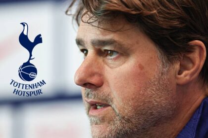 Mauricio Pochettino with Tottenham logo