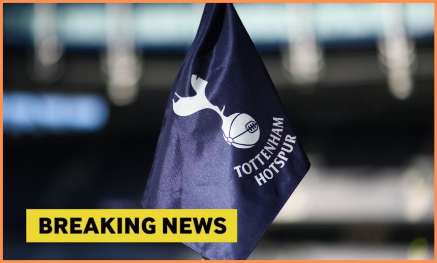Tottenham Hotspur logo on corner flag, and breaking news banner