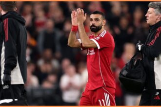 Mohamed Salah applauds the Liverpool fans