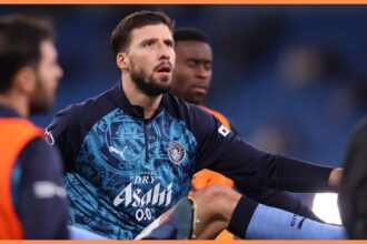 Ruben Dias of Manchester City warms up prior to the Premier League match between Manchester City and Nottingham Forest