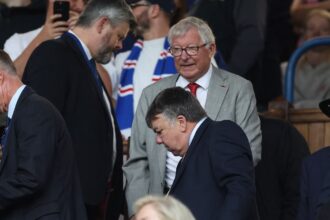 Sir Alex Ferguson and Gary Neville choose between Celtic or Rangers fans