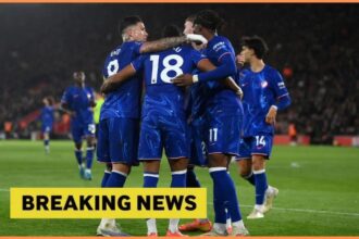 Chelsea players including Enzo Fernandez in a huddle