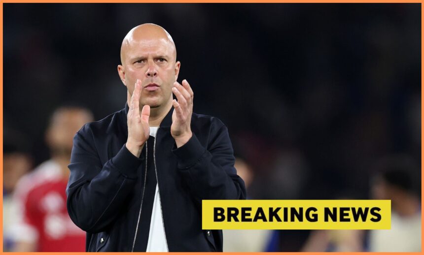 Arne Slot applauds the Liverpool fans, and