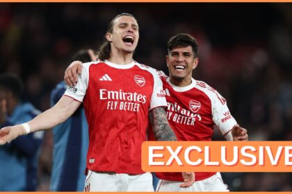 Riccardo Calafiori celebrates with Arsenal teammate Piero Hincapie