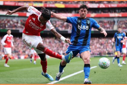 Noni Madueke in action against Marcos Senesi