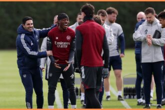 Mikel Arteta and Noni Madueke in Arsenal training