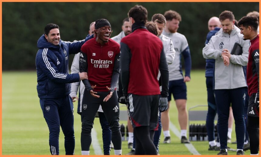 Mikel Arteta and Noni Madueke in Arsenal training