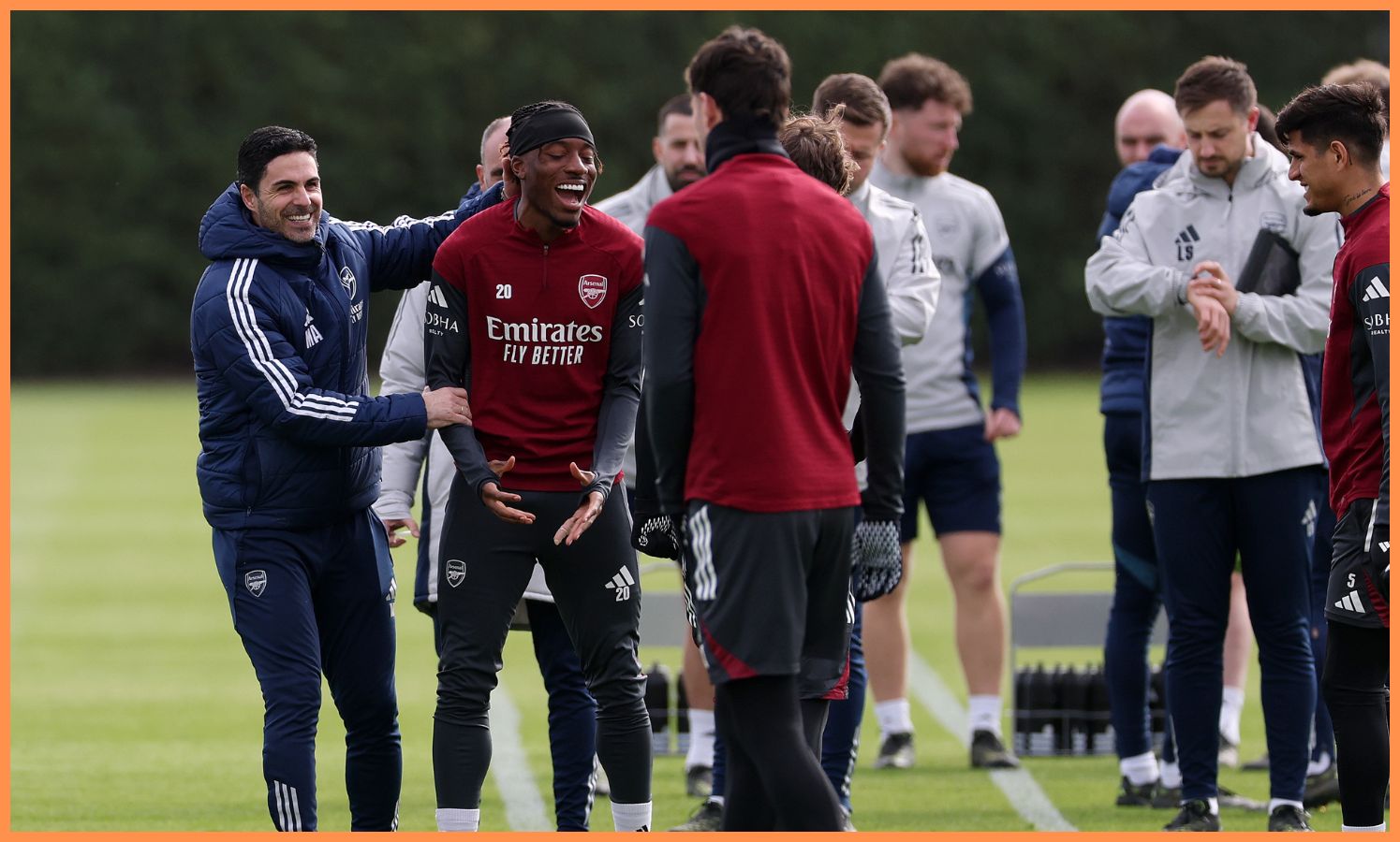 Mikel Arteta and Noni Madueke in Arsenal training